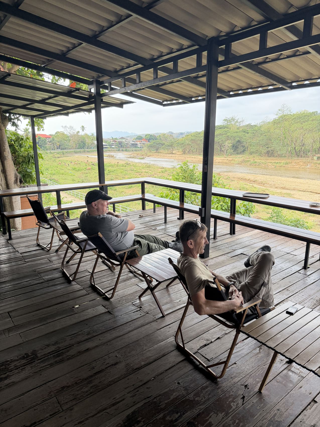 ROAMERS riders taking a rest beside a river